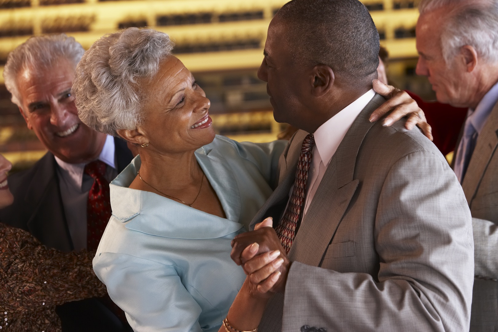 Couples Dancing Together At A Nightclub